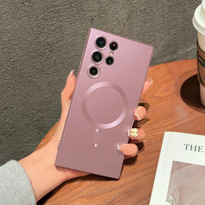a woman holding a purple iphone case