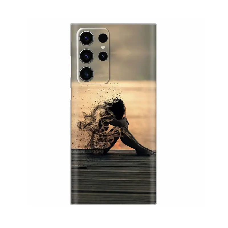 a woman in the water with her head down phone case