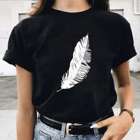 a woman wearing a black t shirt with a white feather on it
