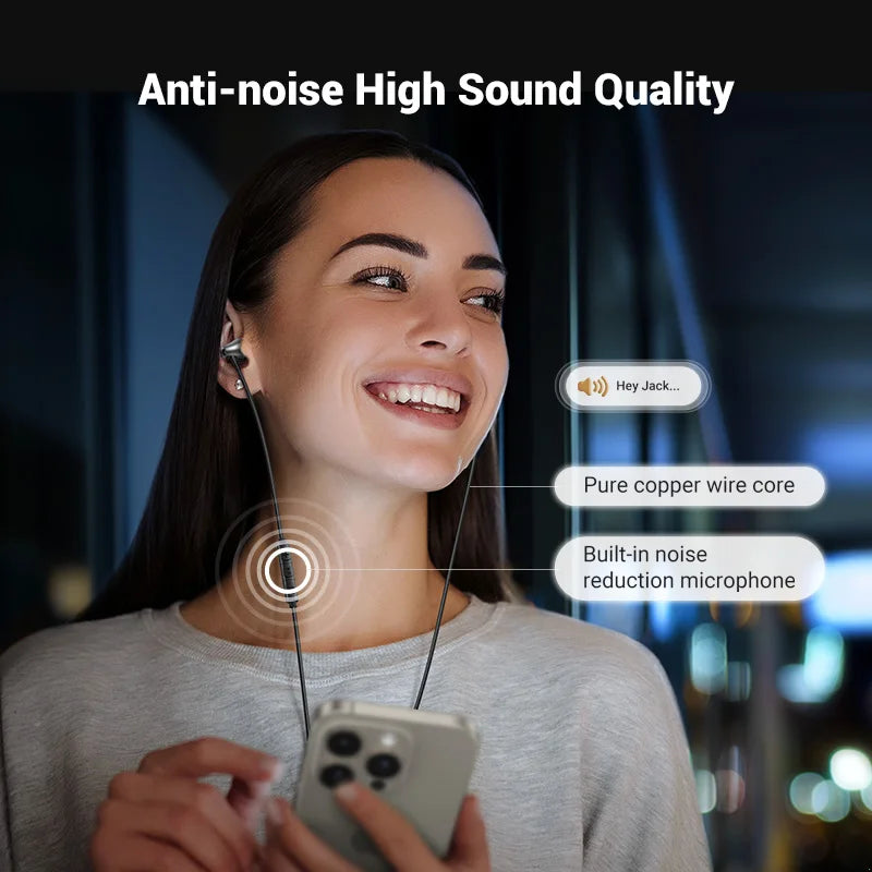 Woman wearing wired earphones.