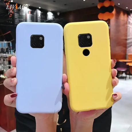 two people holding up their cell cases