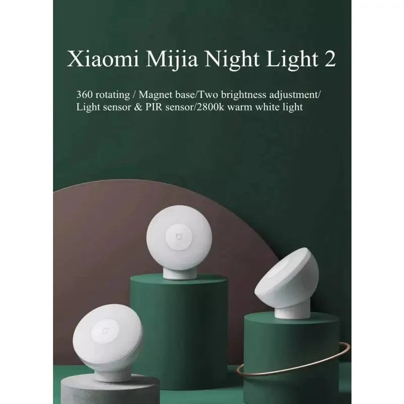 a book cover with three white lamps on top of a green table