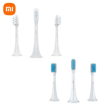 three toothbrushs with different colors and sizes