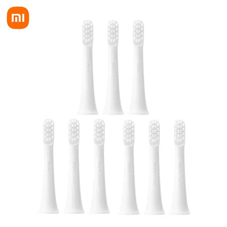 six white toothbrushes with white bristles on a white background