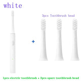 a toothbrush and a toothbrush with the words white
