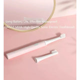 a white toothbrush and a pink background