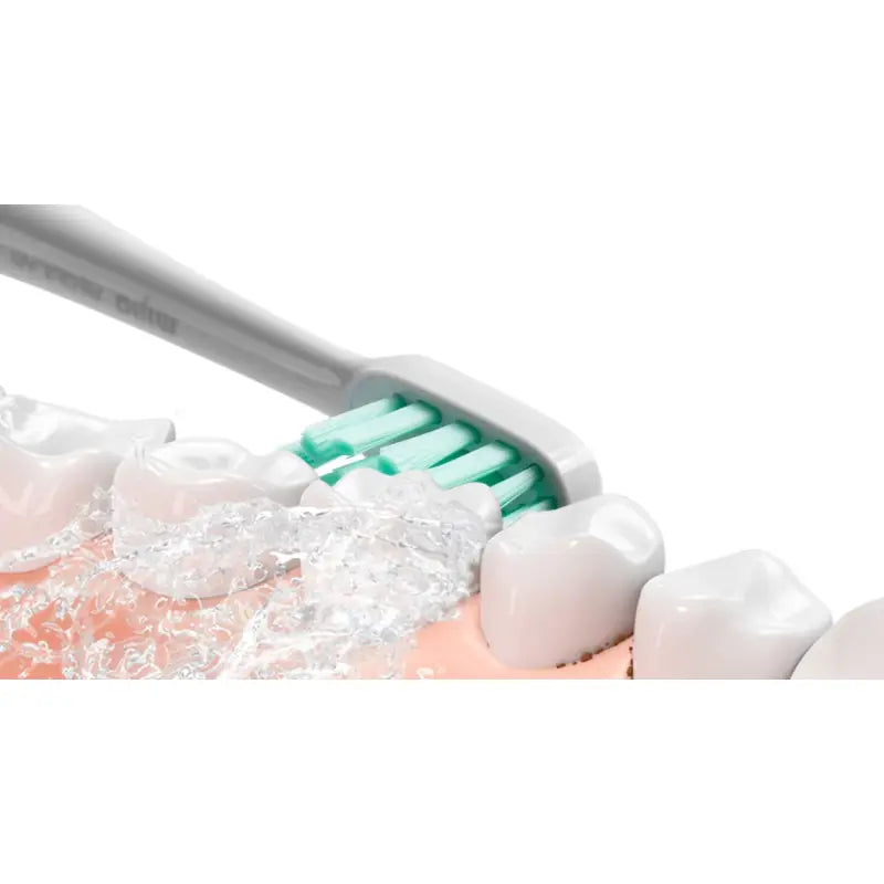 a toothbrush with a toothbrush on top of it
