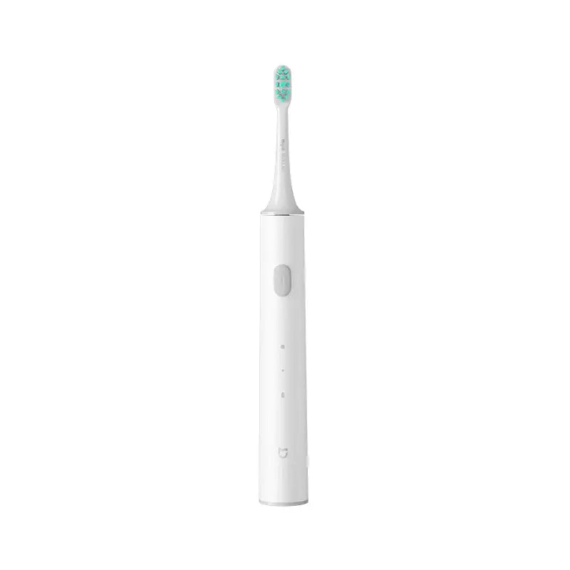 a white electric toothbrush with a green tooth brush