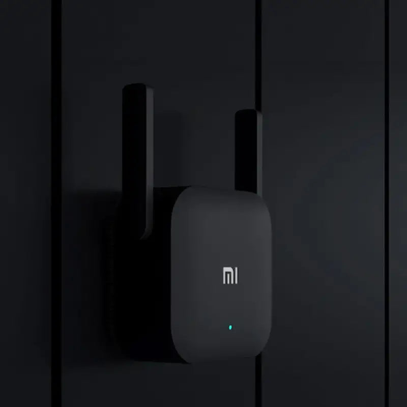 the xiao smart light switch on a black wall
