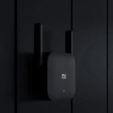 the xiao smart light switch on a black wall