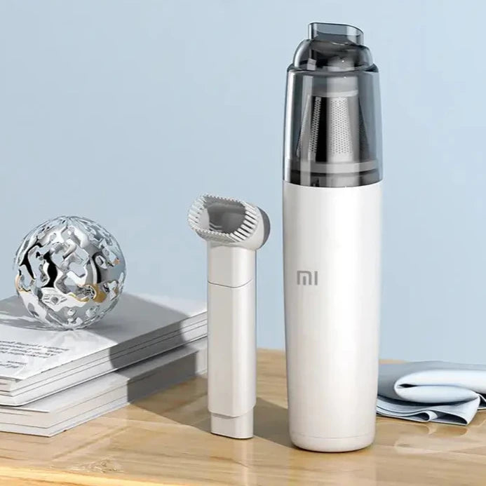 there is a white and black electric shaver and a silver and black hair dryer