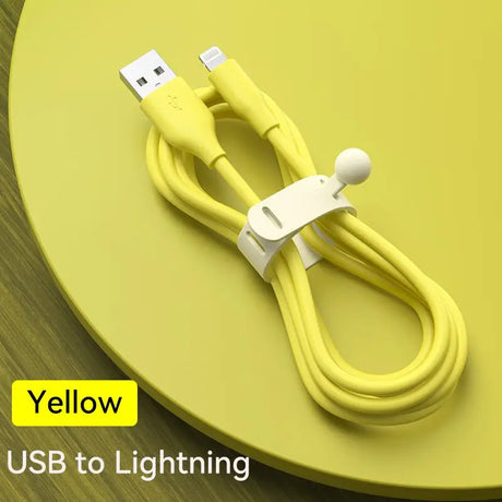 a yellow usb cable on a yellow table