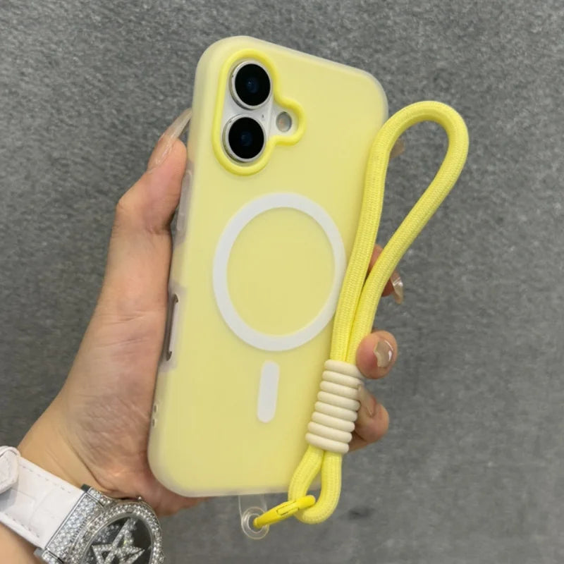 Yellow iPhone case with a white MagSafe ring and a matching wrist strap.