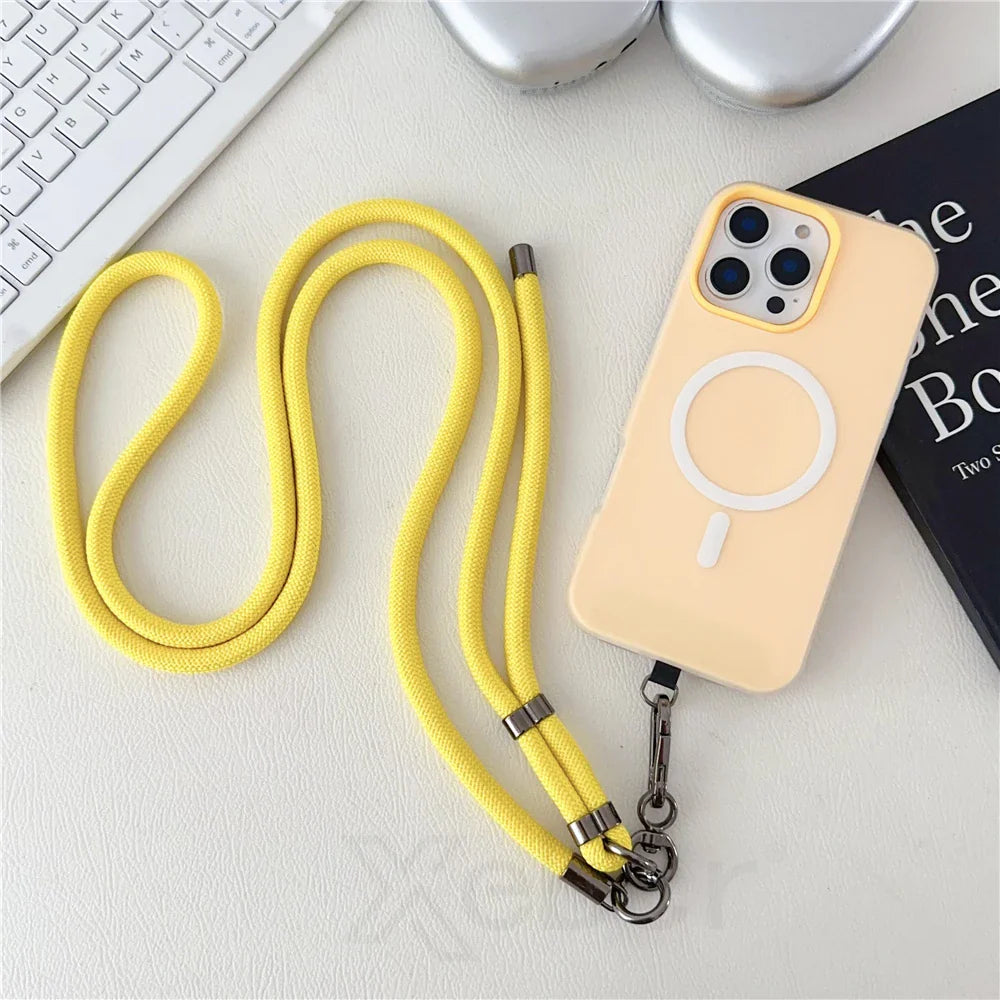 Yellow phone case with lanyard.
