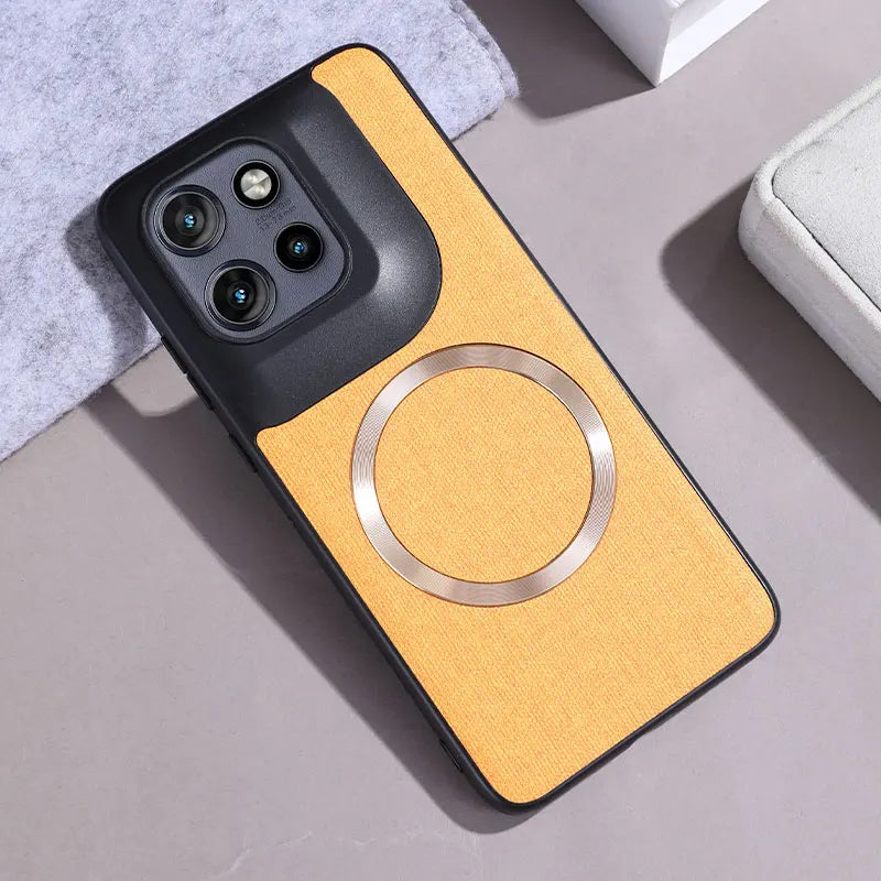 A yellow textured phone case with a black camera module and a metallic ring for magnetic accessories.