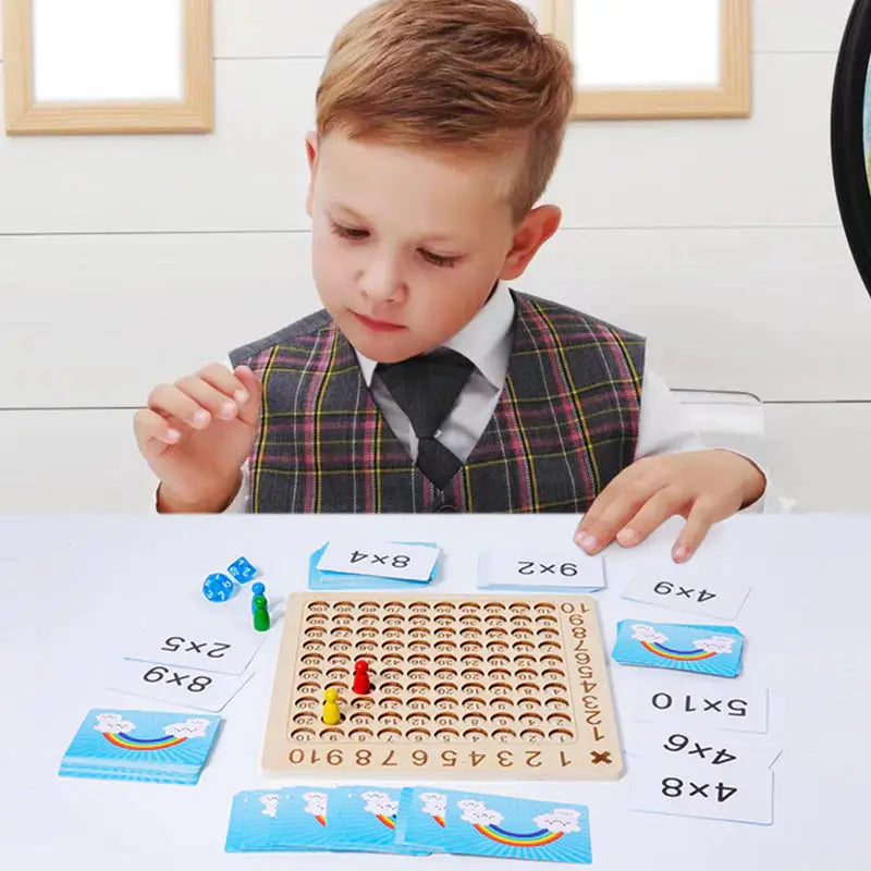 a young boy playing with a wooden board game