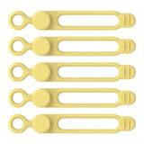 a set of yellow plastic kitchen uts