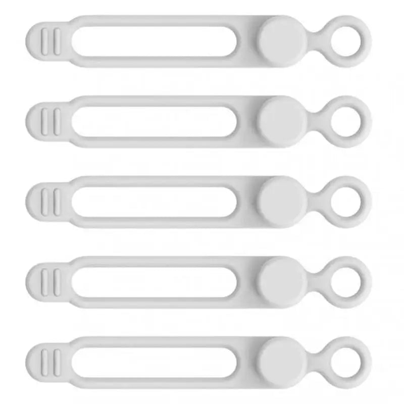 a set of white plastic uts with handles