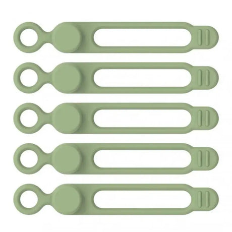 a set of green plastic kitchen uts