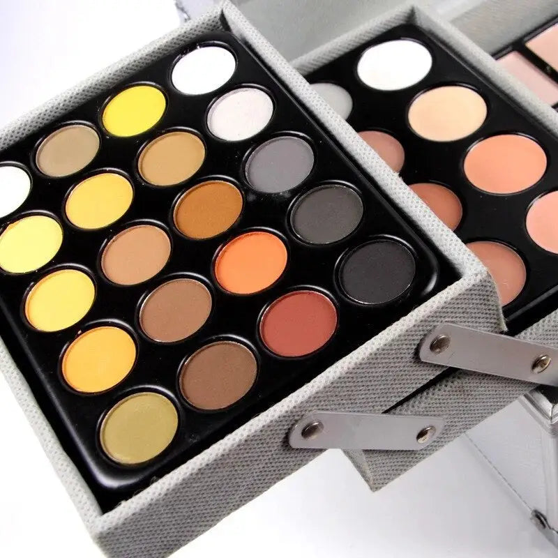 a box with a palette of makeup