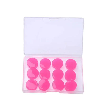 a pink plastic box with a small plastic button