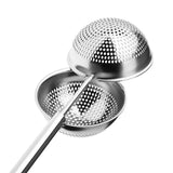 a pair of stainless steel strainers