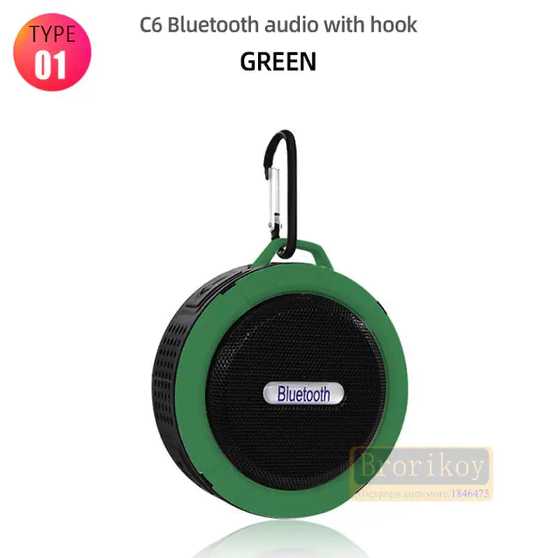 a green bluetooth speaker with hook