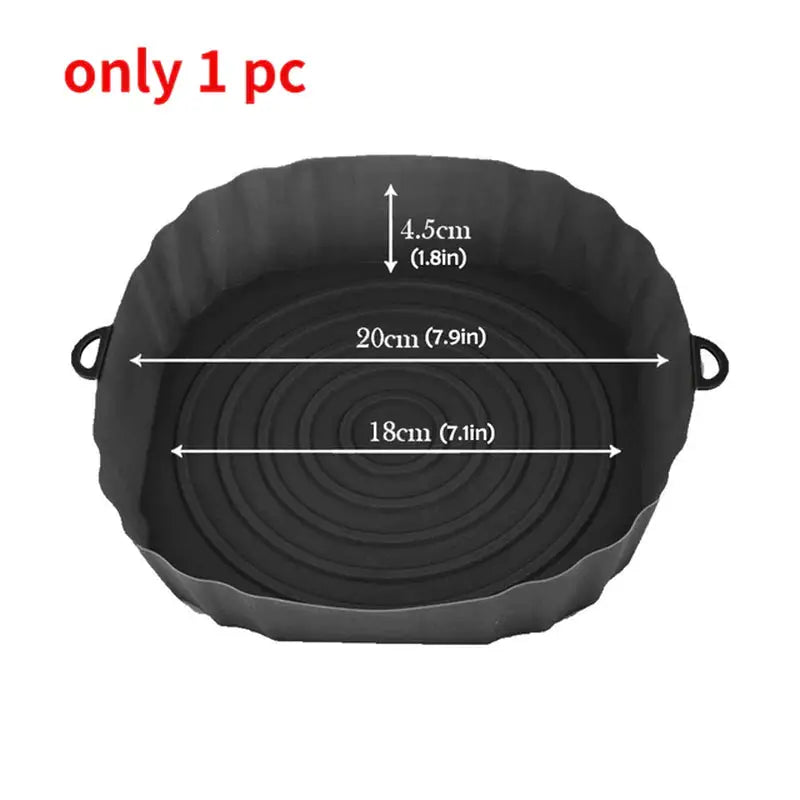 a black pan with measurements for the size of it