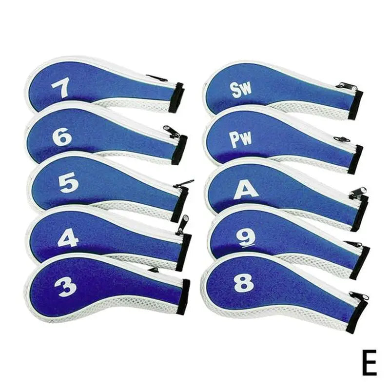 a close up of a number of golf putters with a blue background