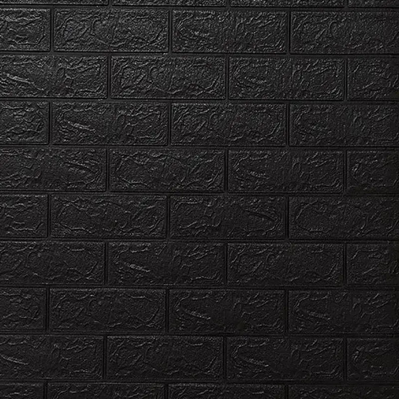 a black brick wall with a white light