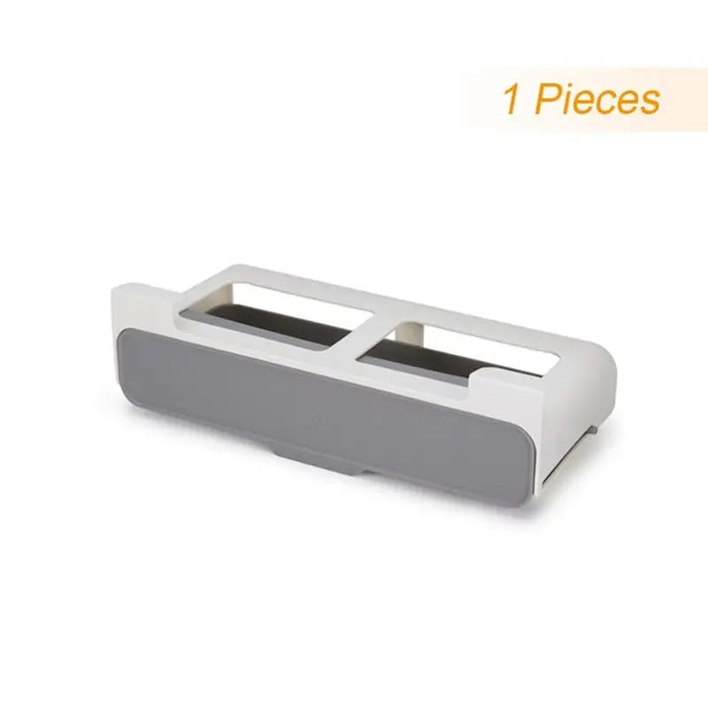 there is a picture of a white and gray desk organizer