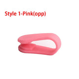 a pink plastic eyelashe with a white background