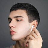 a man with a white earpiece