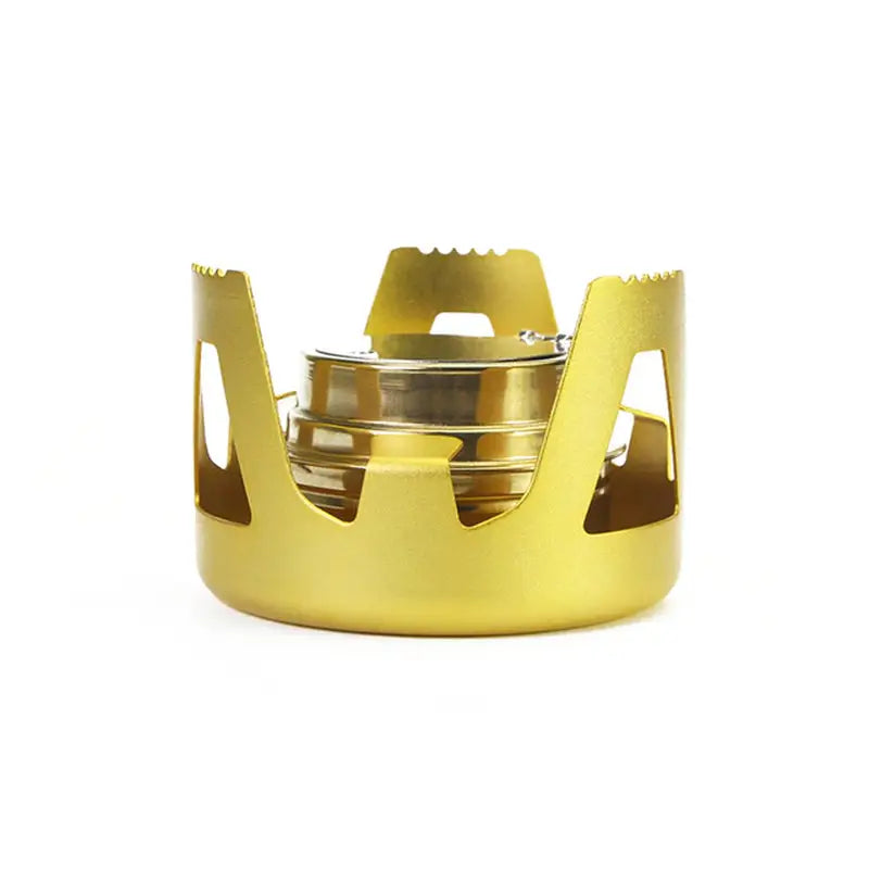 a gold crown ring with a white background