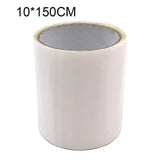 a roll of white tape with a black edge