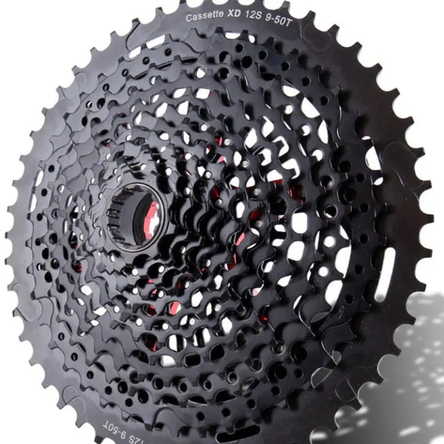 a close up of a bicycle cassetter with a red and black sprock