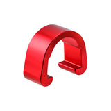 a red metal ring on a white background