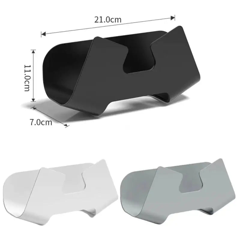 a pair of black and white plastic eye shields