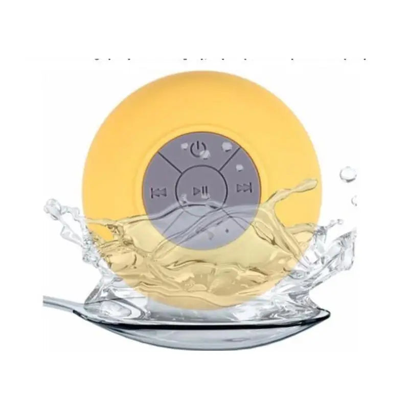 a yellow and white clock on a glass plate