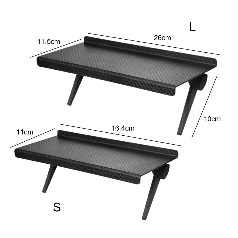 two black trays with handles and legs are shown