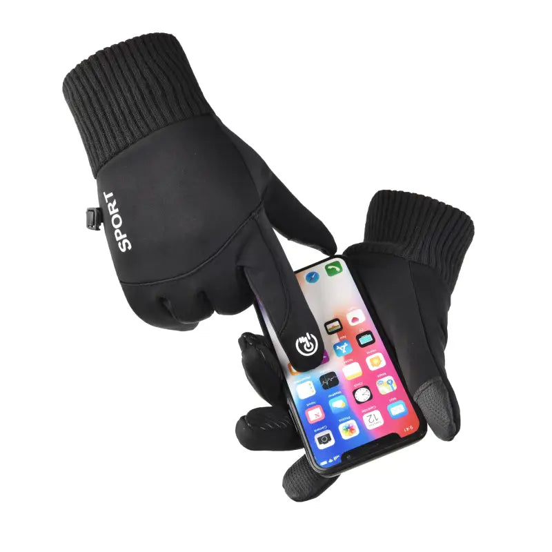 a pair of gloves and a cell phone