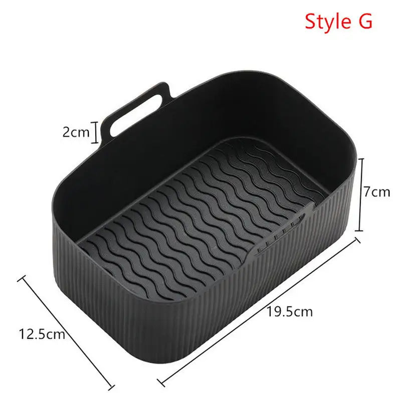 a black plastic tray with a pattern on the bottom