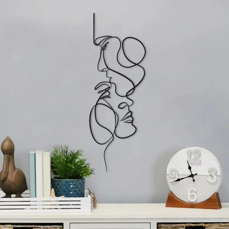 a clock with a drawing of a woman