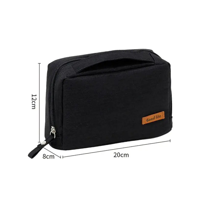 the black canvas cosmetic bag with a zipper closure