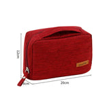 a red cosmetic bag with a zipper closure