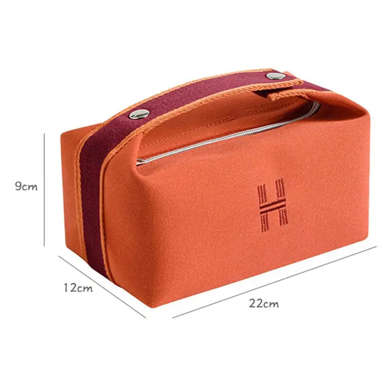 the orange and purple cosmetic bag with a zipper closure