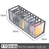 a clear plastic storage box with four compartments