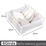 a close up of a box with six pairs of underwear in it