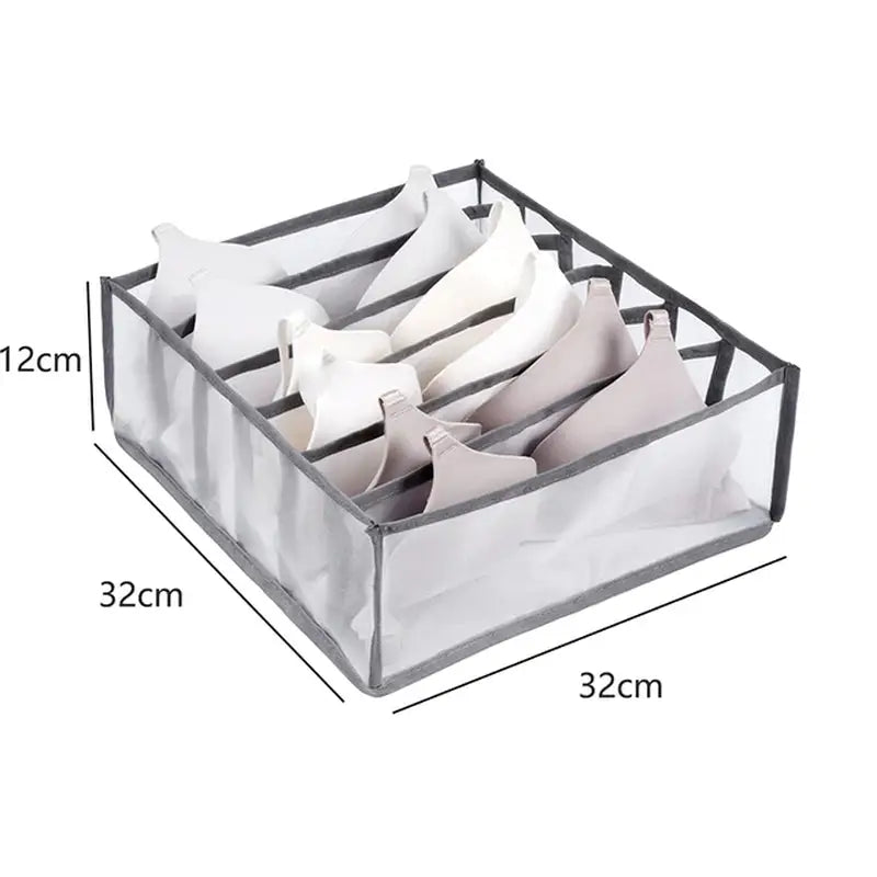 a clear plastic storage box with two compartments