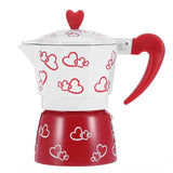 a red and white stove with hearts on it